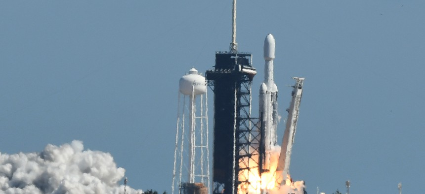 CAPE CANAVERAL, FLORIDA, UNITED STATES - OCTOBER 14: A SpaceX Falcon Heavy rocket carrying the Europa Clipper spacecraft lifts off from pad 39A at the Kennedy Space Center on October 14, 2024 in Cape Canaveral, Florida. The four-year mission will study Europa, one of Jupiter's four largest moons which is believed to have a saltwater ocean beneath its surface, hoping to discover an environment where life could exist beyond Earth.