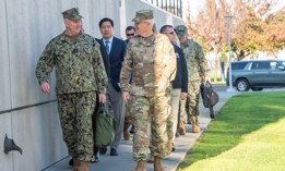 Vice Chairman of the Joint Chiefs of Staff Adm. Christopher Grady and the commander of Space Systems Command, Lt. Gen. Philip Garrant, talk while walking to SSC headquarters on Los Angeles Air Force Base in El Segundo Calif., March 7, 2024. 