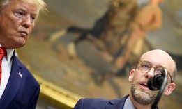 Donald Trump listens while then Office of Management and Budget Director Russell Vought speaks during an event at the White House Oct. 9, 2019. Trump has again asked Vought to lead OMB. 