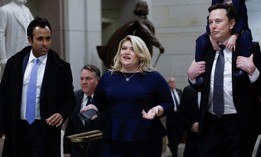 Tesla CEO Elon Musk (R), Co-Chair of the newly announced Department of Government Efficiency (DOGE) carries his son on his shoulders at the U.S. Capitol following a meeting with businessman Vivek Ramaswamy (L), Co-Chair of the newly announced Department of Government Efficiency, Rep. Kat Cammack (C), and other members of the U.S. Congress on December 05, 2024 in Washington, DC.