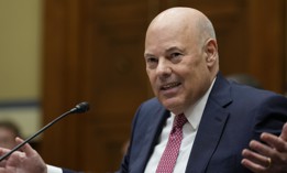 Postmaster General Louis DeJoy testifies during a hearing on Capitol Hill in May 17, 2023. He said Tuesday that USPS will cautiously proceed with his operational plans. 