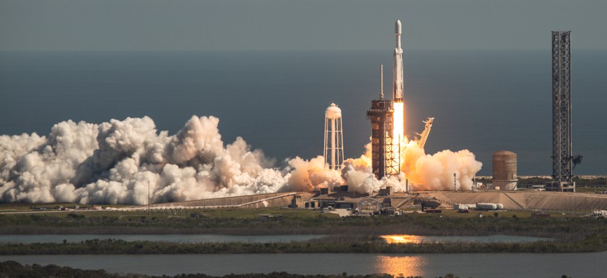 A SpaceX Falcon Heavy rocket lifts off from launch pad 39A at the Kennedy Space Center, carrying the NASA probe Europa Clipper on its way to Jupiter, where it makes observations of its satellite Europa, searching for clues of life.