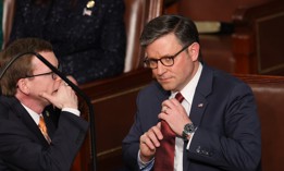 Rep. Mike Johnson, R-La., talks to Rep. Dusty Johnson, R-S.D., as the House votes for a speaker in the U.S. Capitol Building on Jan. 3, 2025. 