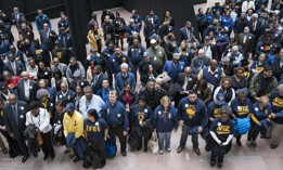 Members and supporters of the American Federation of Government Employees in the Hart Senate Office Building Atrium in Feb. 11, 2020. The EEOC has recommended that agencies undertake efforts to identify and address barriers that create gender pay differences among federal workers. 