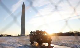 A law enforcement vehicle is seen near the Washington Monument on inauguration day. While nominees await Senate confirmation, federal agencies will be led almost exclusively by career federal executives.