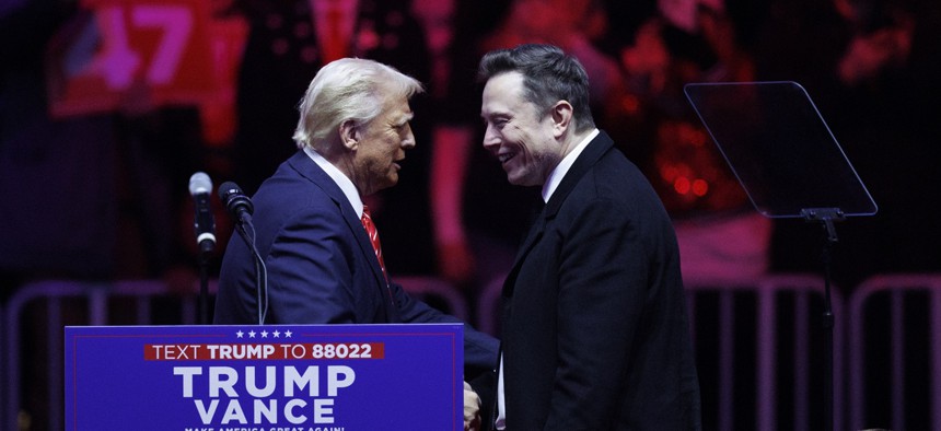 Tech CEO Elon Musk walks on stage beside President Donald Trump during a rally at Capital One Arena in Washington, on January 19, 2025. Musk and Trump have both voiced desire for the U.S. to aim for sending humans to Mars in planned space efforts.