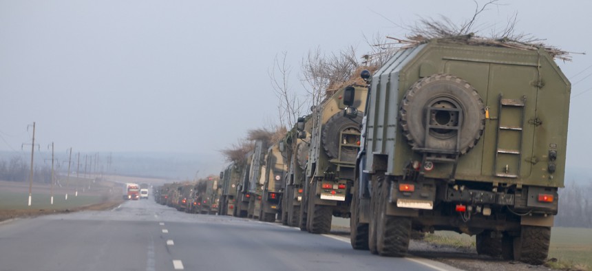 A convoy of Russian military vehicles is seen as the vehicles move towards border in Donbas region of eastern Ukraine on February 23, 2022.