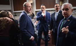 Stephen Feinberg (3rd L), U.S. President Donald Trump's nominee to be deputy secretary of defense, confers with Sen. Jack Reed (R) (D-RI) prior to testifying before the Senate Armed Services Committee confirmation hearing, February 25, 2025.