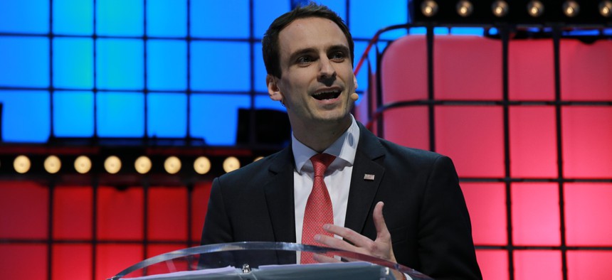 Then-White House CTO Michael Kratsios delivers a speech on the last day of the Web Summit in Lisbon on Nov. 7, 2019. Kratsios said at a May 19 event that federal agencies "need to be sort of resetting" the way they think about spending at science agencies.