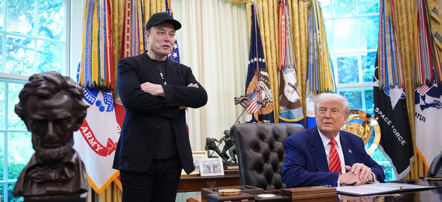 President Doanld Trump, joined by Tesla CEO Elon Musk, speaks to reporters in the Oval Office of the White House on May 30, 2025 in Washington, DC. Musk, who served as an adviser to Trump and led the Department of Government Efficiency, left his role in the Trump administration early that week to refocus on his businesses.
