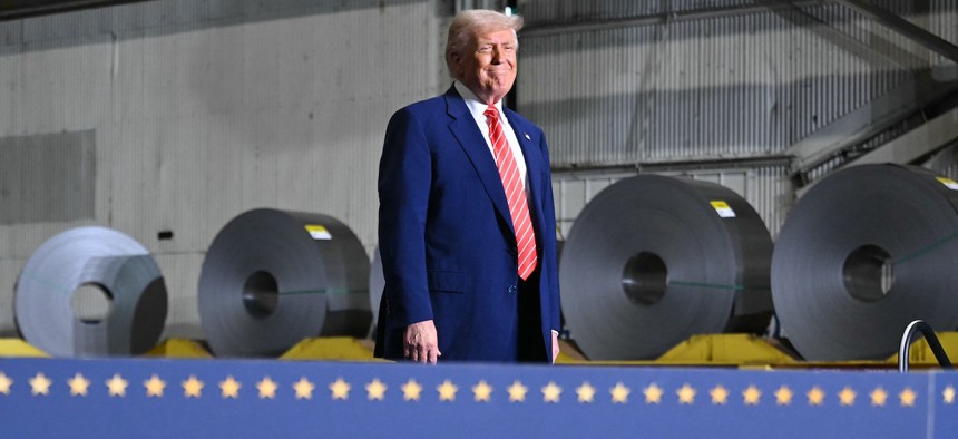 President Donald Trump arrives to speak during a visit to US Steel - Irvin Works in West Mifflin, Pa. on May 30, 2025. The president’s full fiscal 2026 budget proposal would cut more than 100,000 federal jobs.
