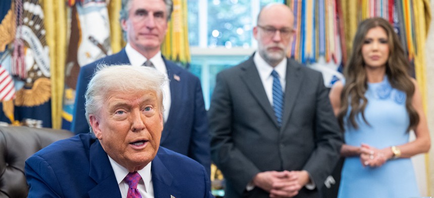 President Donald Trump, alongside Interior Secretary Doug Burgum, Office of Management and Budget Director Russell Vought and Homeland Security Secretary Kristi Noem in the Oval Office on June 10, 2025. Trump and Noem discussed some of the ways they would like to reform the Federal Emergency Management Agency.
