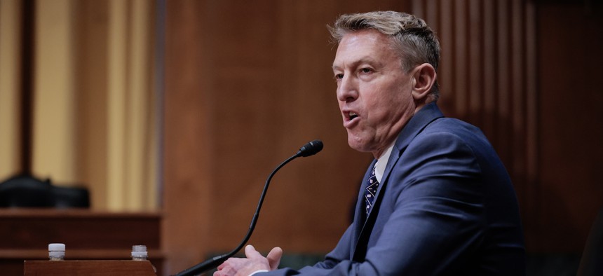 Rodney Scott, President Trump's nominee to be chief of Customs and Border Protection, prepares to testify during his confirmation hearing before the Senate Finance Committee on Capitol Hill on April 30, 2025.