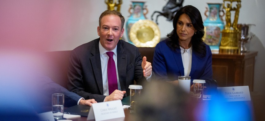 EPA Administrator Lee Zeldin, left, speaks during a cabinet meeting with President Trump at the White House on July 8, 2025.