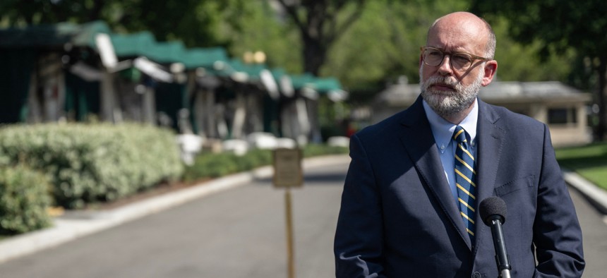 Office of Management and Budget Director and acting Consumer Financial Protection Bureau Director Russ Vought speaks to reporters outside the West Wing of the White House on July 17, 2025.