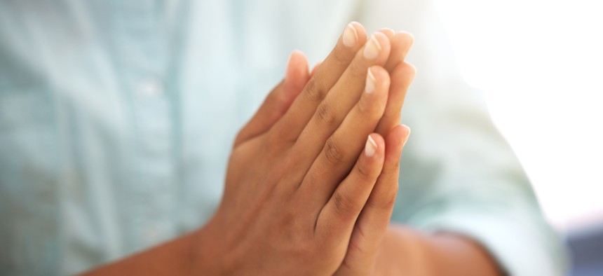 OPM officials said in new guidance that one employee can engage another “in polite discussion of why his faith is correct and why the non-adherent should rethink his religious beliefs," unless the non-adherent requests they stop.