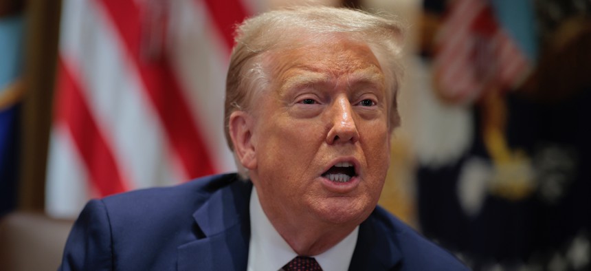 President Donald Trump speaks during a cabinet meeting at the White House on Aug. 26, 2025. Trump issued a new executive order ending collective bargaining at additional agencies.