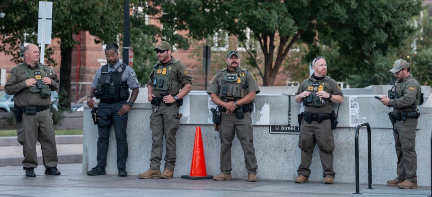 Members of the Border Patrol guard a metro station on U Street in Washington, D.C., on Aug. 31, 2025. The Trump administration has deployed federal officers and the National Guard to the District in order to place the DC Metropolitan Police Department under federal control and assist in crime prevention in the nation's capital.