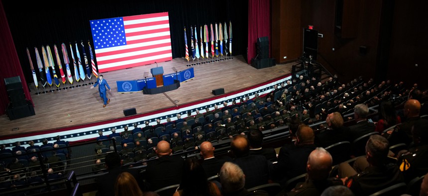 Defense Secretary Pete Hegseth addresses senior military officers at Marine Corps Base Quantico in Quantico, Va., on Sept. 30, 2025.