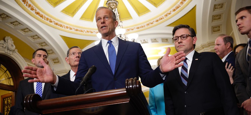 Senate Majority Leader John Thune, R-S.D., joined by Speaker of the House Mike Johnson, R-La., speaks to members of the media following the Republican Senate Policy Luncheon at the U.S. Capitol on Oct. 7, 2025.