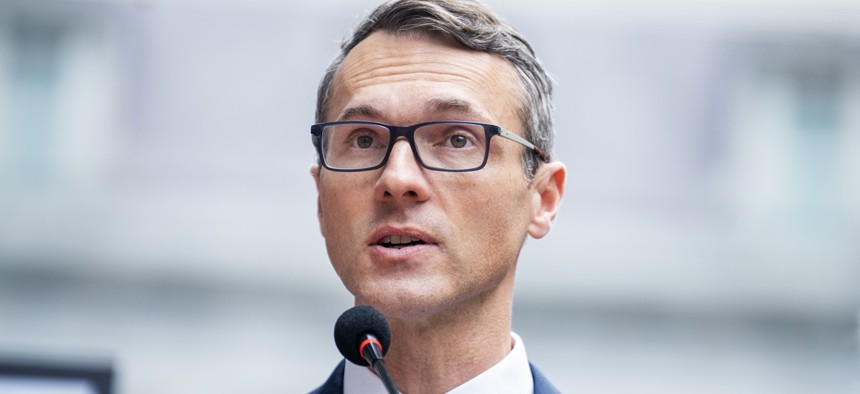 Rep. James Walkinshaw, D-Va., speaks during a news conference with Maryland and Virginia Congressional Democrats to speak out against the Trump administration's "illegal mass firings of public servants," across the street from the Eisenhower Executive Office Building on Oct. 14, 2025.