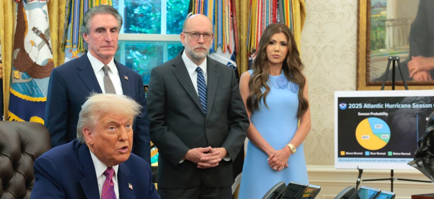 President Donald Trump; joined by Interior Secretary Doug Burgum, Office of Management and Budget Director Russell Vought and Homeland Security Secretary Kristi Noem; delivers a statement on natural disaster preparedness at the White House on June 10, 2025.