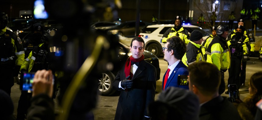 Paul Ingrassia, left, outside of the D.C. Central Detention Facility on Jan. 20. As of Tuesday, Ingrassia is no longer the nominee to lead the Office of Special Counsel.