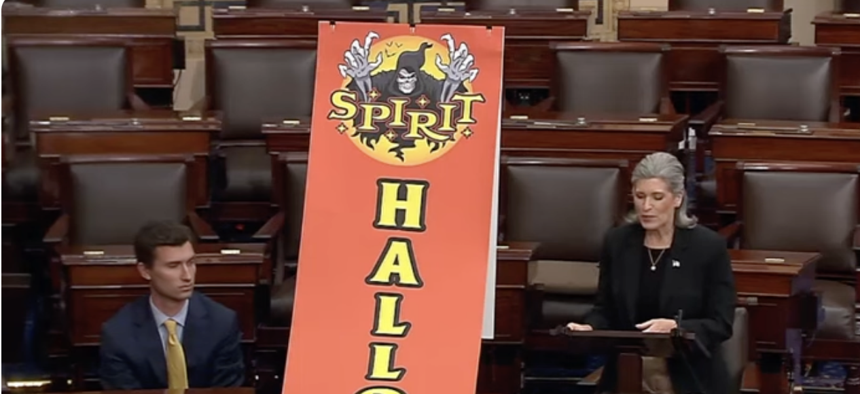 Sen. Joni Ernst, R-Iowa, speaks on the Senate floor on Oct. 30, arguing that Spirit Halloween stores could be an ideal for federal real estate.