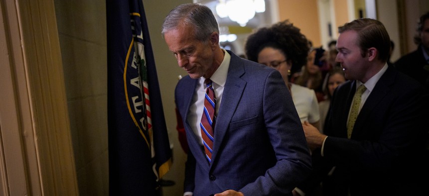 Senate Majority Leader John Thune, R-S.D., returns to his Capitol Hill office on Nov. 10, 2025 after the Senate passed legislation to reopen the government.