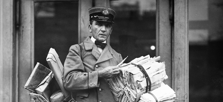 Portrait of a U.S. mail carrier circa 1923. The hosts of "People of Agency" tell the stories of postal employees throughout history.