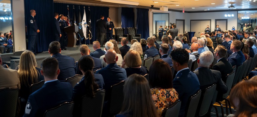 Guardians, instructors, and guests gather on Aug. 28, 2025 during the Officer Training Course graduation at Peterson Space Force Base, Colo.