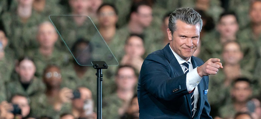 U.S. Secretary of War Pete Hegseth delivers a speech ahead of the arrival of President Donald Trump aboard USS George Washington on October 28, 2025 in Yokosuka, Japan.