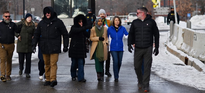 Rep. Ilhan Omar, D‑Minn., and Rep. Angie Craig, D‑Minn., exited the Bishop Henry Whipple Federal Building with Rep. Kelly Morrison and other state lawmakers after meeting with immigration officials in Minneapolis on Jan. 10, 2026.