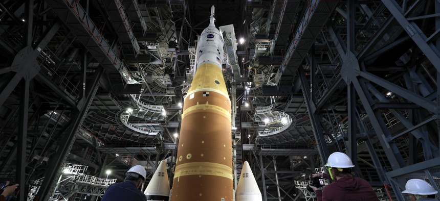 CAPE CANAVERAL, FLORIDA - JANUARY 16: NASA's Artemis II sits in the Vehicle Assembly Building at NASA’s Kennedy Space Center on January 16, 2026 in Cape Canaveral, Florida. NASA’s integrated SLS (Space Launch System) rocket and Orion spacecraft for the Artemis II mission are prepared for a scheduled rollout to Launch Pad 39B before the February 2026 10-day mission, which will take the crew around the Moon and back to Earth.