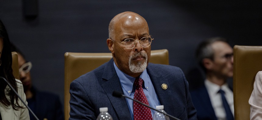 Rep. Glenn Ivey, D-Md., at a field hearing in Minnesota on Jan. 16. He expressed concerns on Thursday that a future president like Donald Trump would "run roughshod" over reforms Congress could implement.