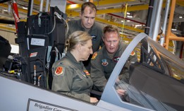 Members of the Michigan National Guard explore the cockpit of an F-15EX Eagle II aircraft at the Boeing production plant in St. Louis, Missouri, Nov. 13, 2025. 