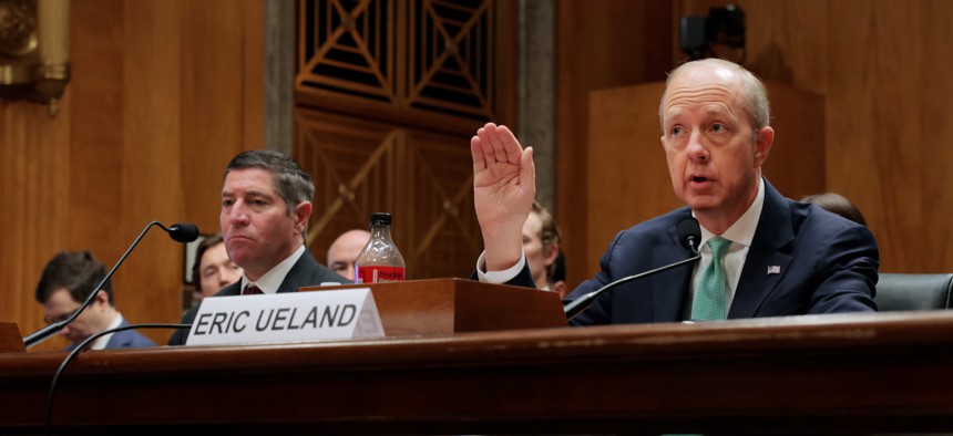 OMB Deputy Director for Management Eric Ueland, right, speaks alongside OPM Director Scott Kupor during a hearing with the Senate Committee on Homeland Security and Governmental Affairs on Capitol Hill on April 3, 2025. Ueland said Thursday that federal employees' ability to make change will be "significantly enhanced in an at-will organization".