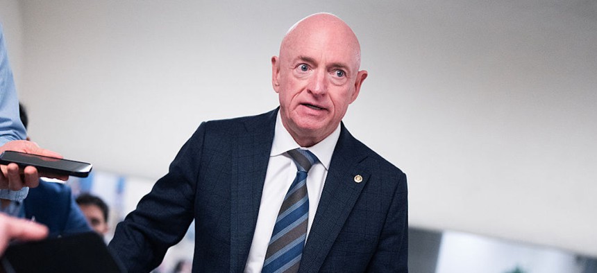  Sen. Mark Kelly, D-Ariz., talks with reporters in the U.S. Capitol after a Senate Armed Services Committee closed briefing on the Iran war on Tuesday, March 10, 2026.