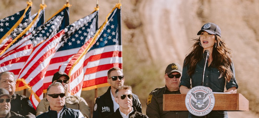 Kristi Noem speaks during a press conference near the border wall between the U.S. and Mexico in Nogales, Ariz., on Feb. 4, 2026. 