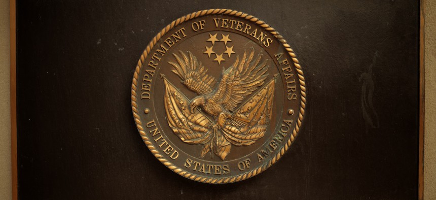 A plaque with the Department of Veterans Affairs' seal is displayed outside the VA headquarters on March 6, 2025.