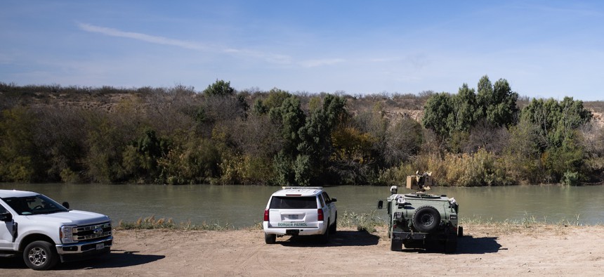 U.S. Army and Border Patrol officers overlook the Rio Grande River in Laredo, Texas, on Feb. 5, 2026. 
