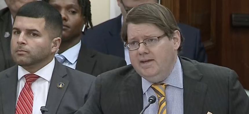 Agriculture Undersecretary Stephen Vaden (right) testifies about the department's reorganization plans in July 2025. 