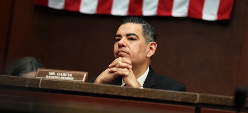 Rep. Robert Garcia, D-Calif., argued that forced distribution systems would violate federal law requiring that performance appraisal systems at federal agencies must evaluate employees based on objective metrics.