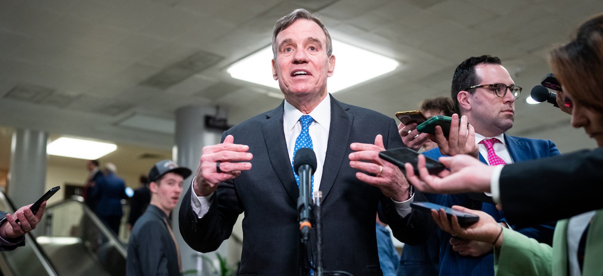 Sen. Mark Warner, D-Va., led 14 senators in asking OPM to rescind its request to collect federal employee health care data.