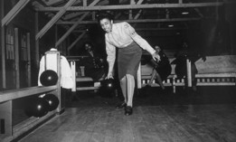 Master Sgt. Helen Starr, of the Women's Army Corps Detachment #2, approaches the lane ready to dispatch the ball at the bowling alley at Fort McClellan, Ala., on Jan. 27, 1944. Many military bases throughout the country maintain bowling alleys on site. Two staff involved in “bowling equipment repairing” will see their job series phased out.