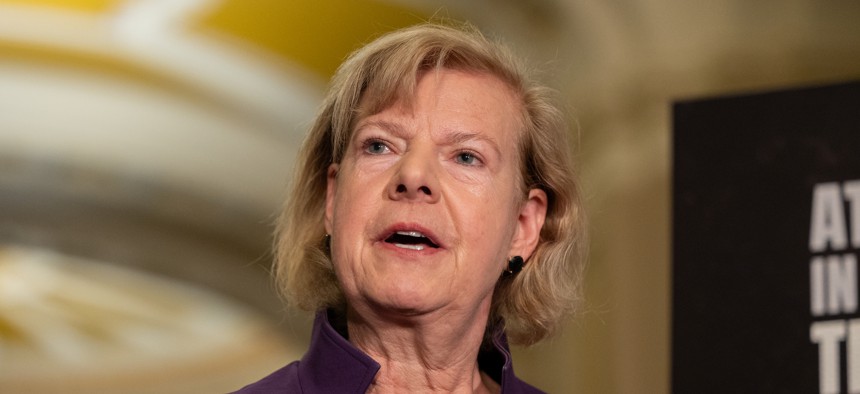 Sen. Tammy Baldwin, D-Wis., speaks at a press conference on Oct. 28, 2025. She said that senators "cannot allow the promotion of officers into the Coast Guard's senior ranks who have substantiated claims of retaliation in their records.”