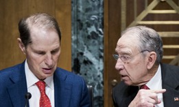 Sen. Chuck Grassley, R-Iowa (right) speaks with Sen. Ron Wyden, D-Ore., (left) before the start of a hearing on Feb. 2, 2019. They are spearheading the Senate version of the IRS Whistleblower Program Improvement Act. 