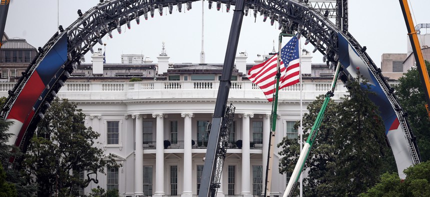 Construction continues for the upcoming UFC match on the South Lawn of the White House on May 26, 2026. The second Trump administration has placed political appointees at agencies that haven't had them in recent years.
