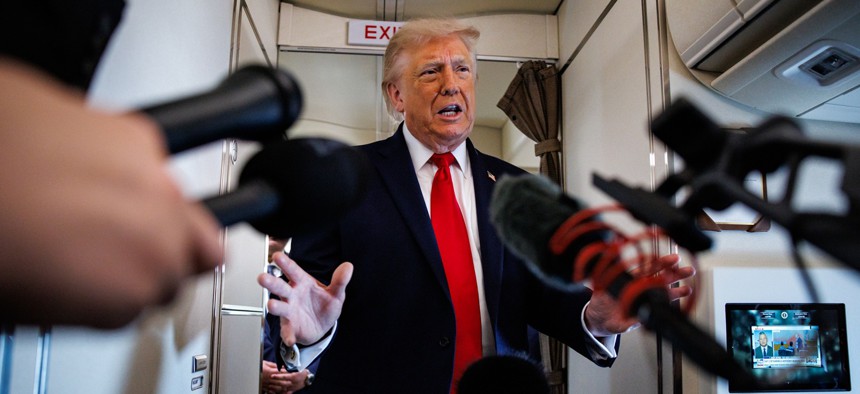 President Donald Trump speaks with reporters while aboard Air Force One on June 5, 2026 en route to Chippewa Falls, Wis. More AI-related guidance is expected soon.