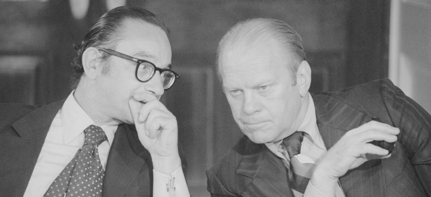 President Gerald Ford, right, huddles with Alan Greenspan, the new Chairman of the Council of Economic Advisers, at the White House on Sept. 5, 1974.